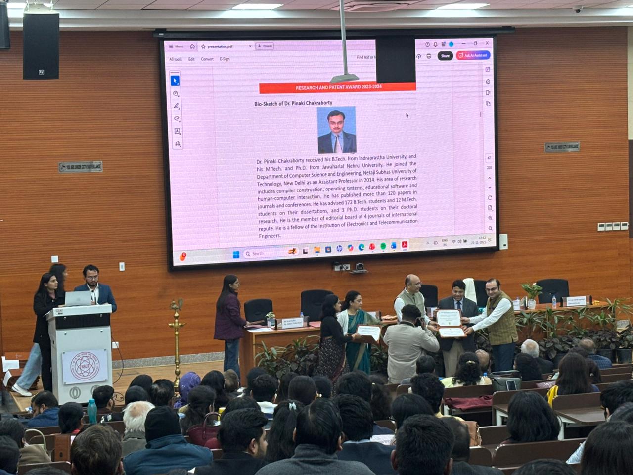 11. Receiving an award for my research at the university.